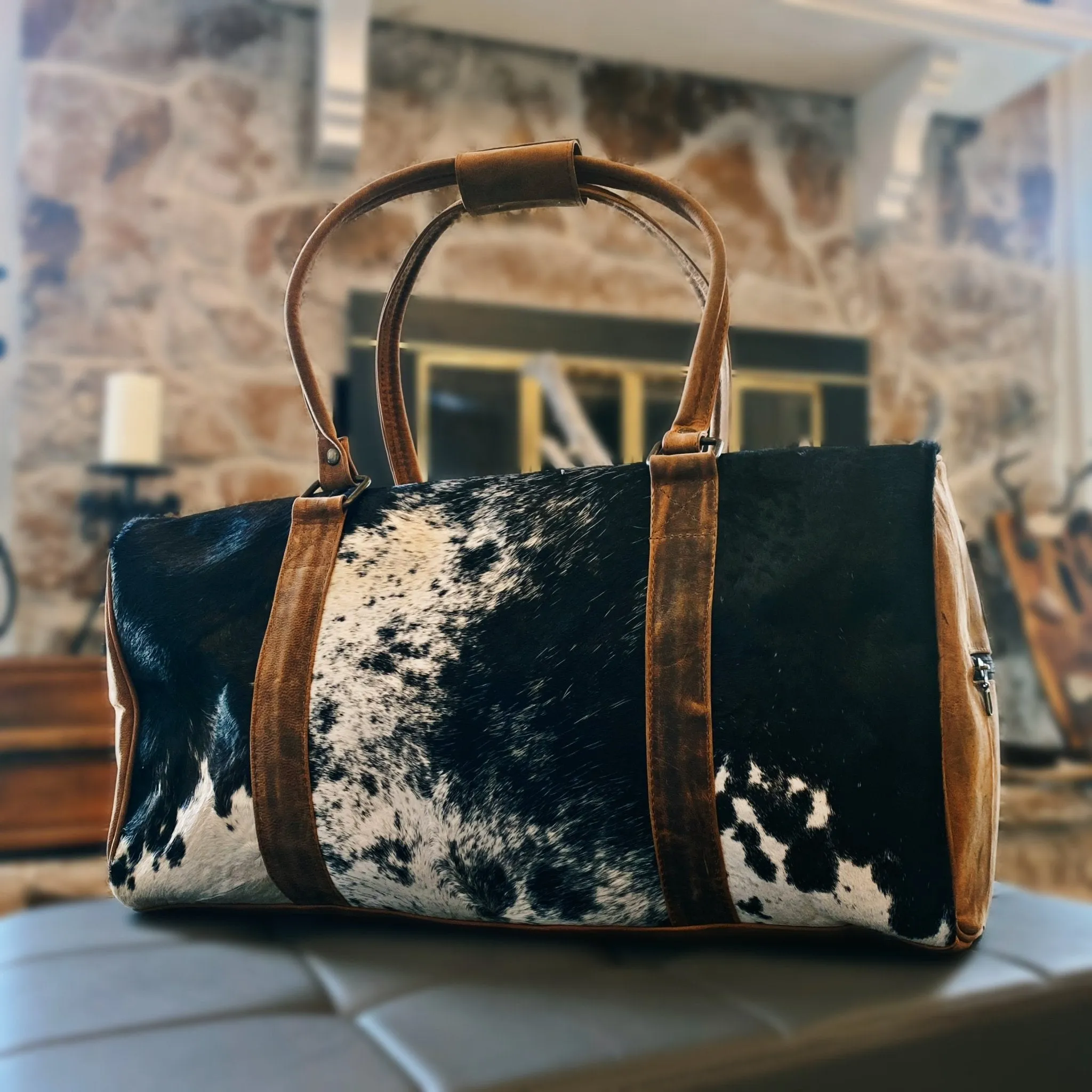 Black and White Spotted Cowhide Genuine Distressed Leather Barrel Duffel Bag